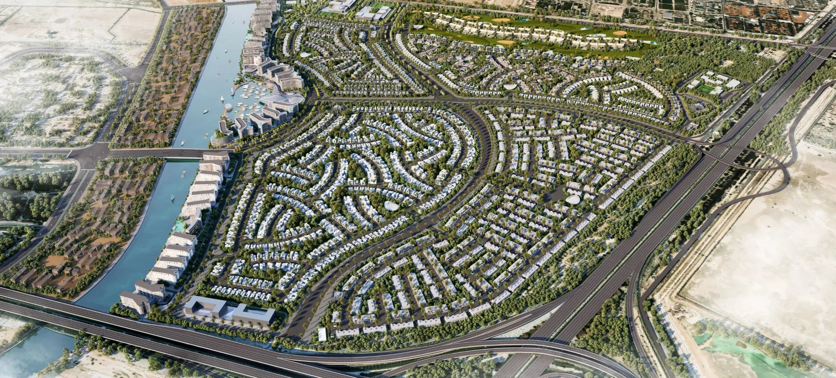 Aerial view of a planned residential area with roads and waterways.